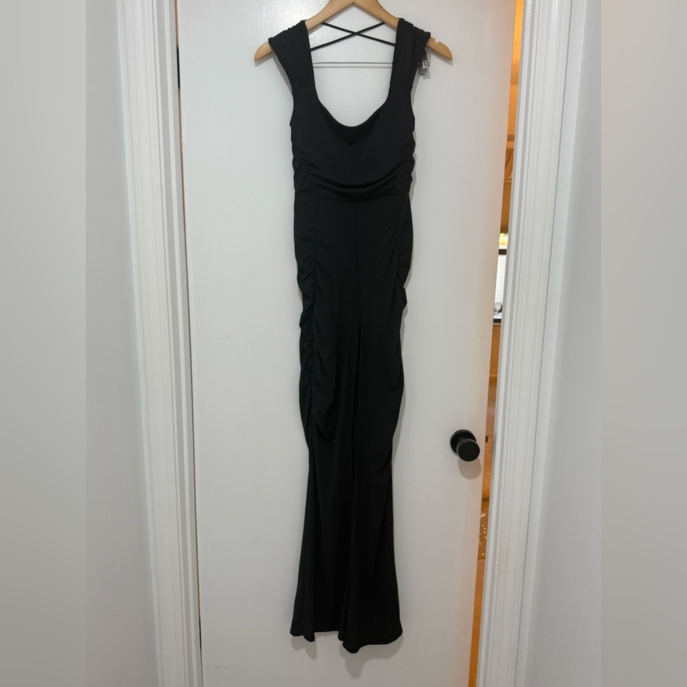 NWT FREE people movement jumpsuit sold out so adorable size small
